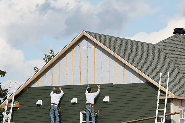 Professional Vinyl Siding technician working in Riverside, PA